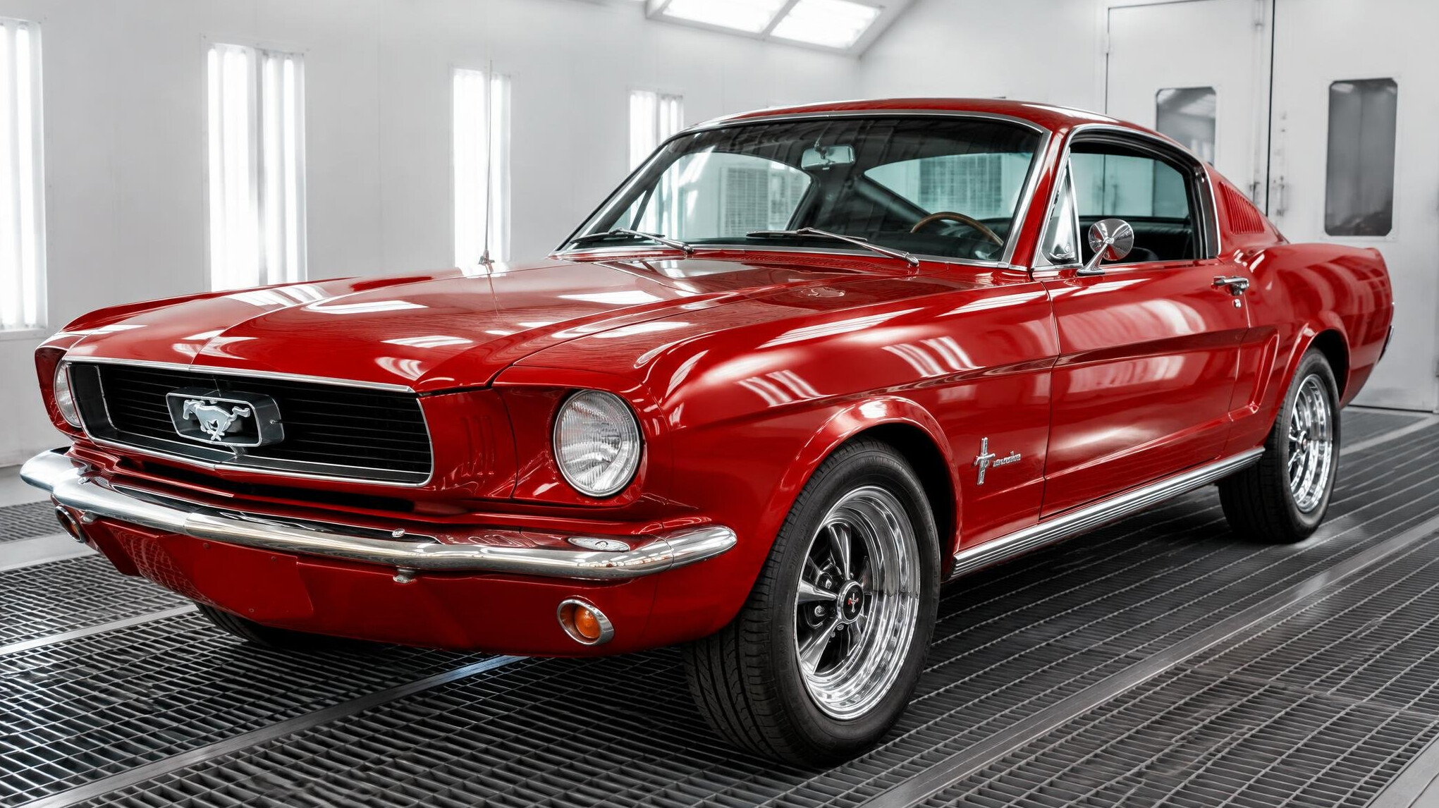 Classic car with a freshly finished glossy red paint