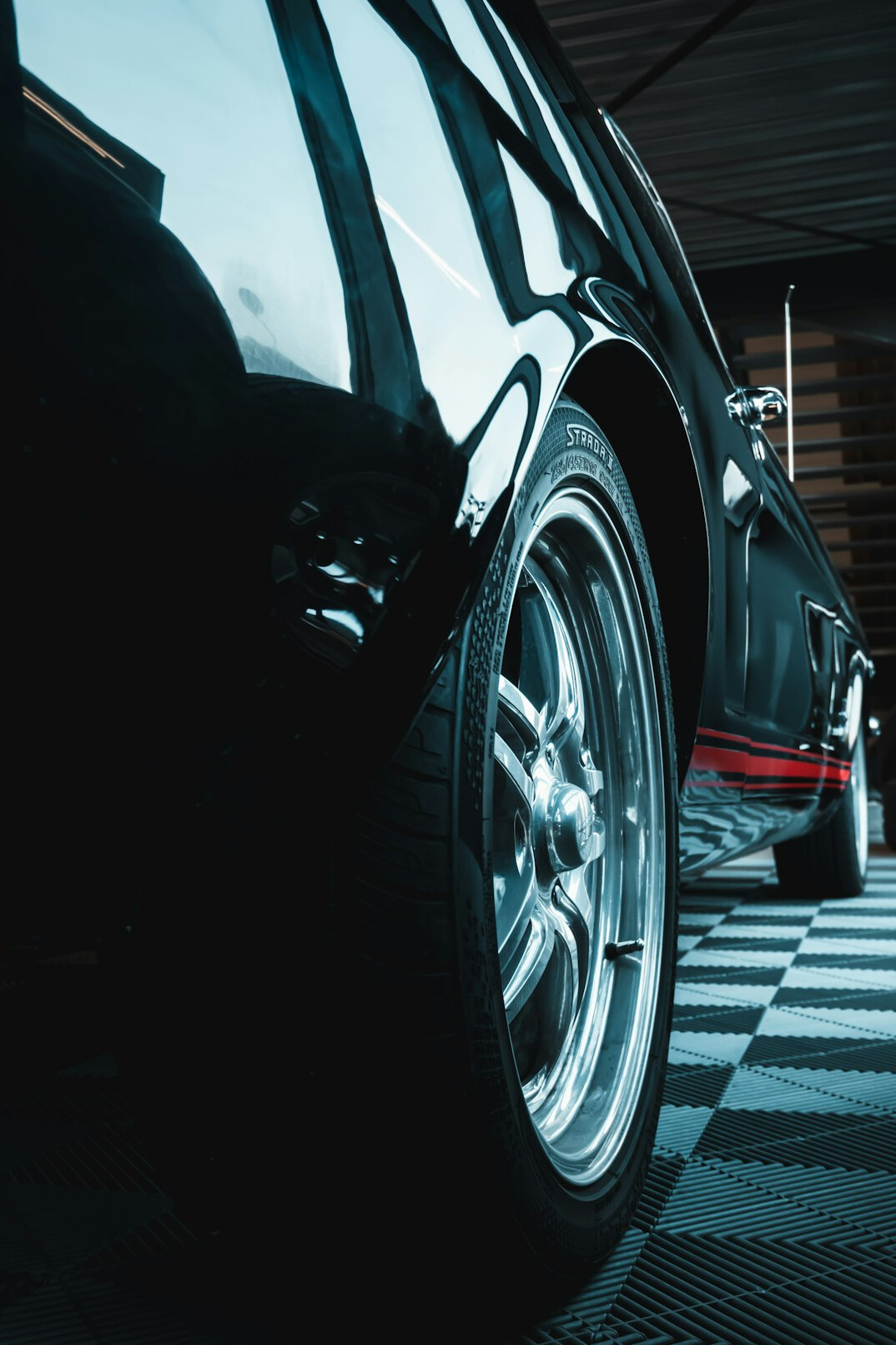 Sports car with a deep polished finish in a garage