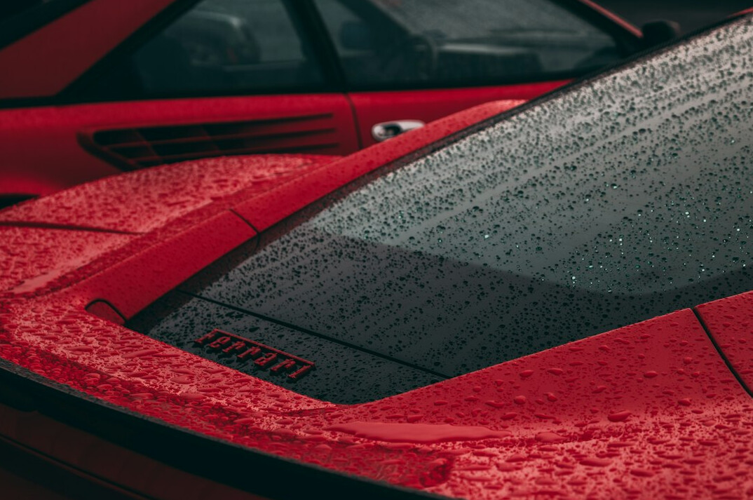 Luxury car with a ceramic coating showing water beading
